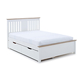 A white, wooden, double-sized bed with a mattress, featuring under-bed storage drawers, against a plain white background.