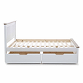 A white wooden daybed with an extended pull-out section and storage drawers, set against a plain white background.
