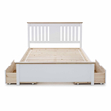 A white wooden bed frame with a slatted base and a headboard, featuring under-bed storage drawers, isolated on a white background.
