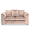 Velvet beige couch with plush cushions against a white background.