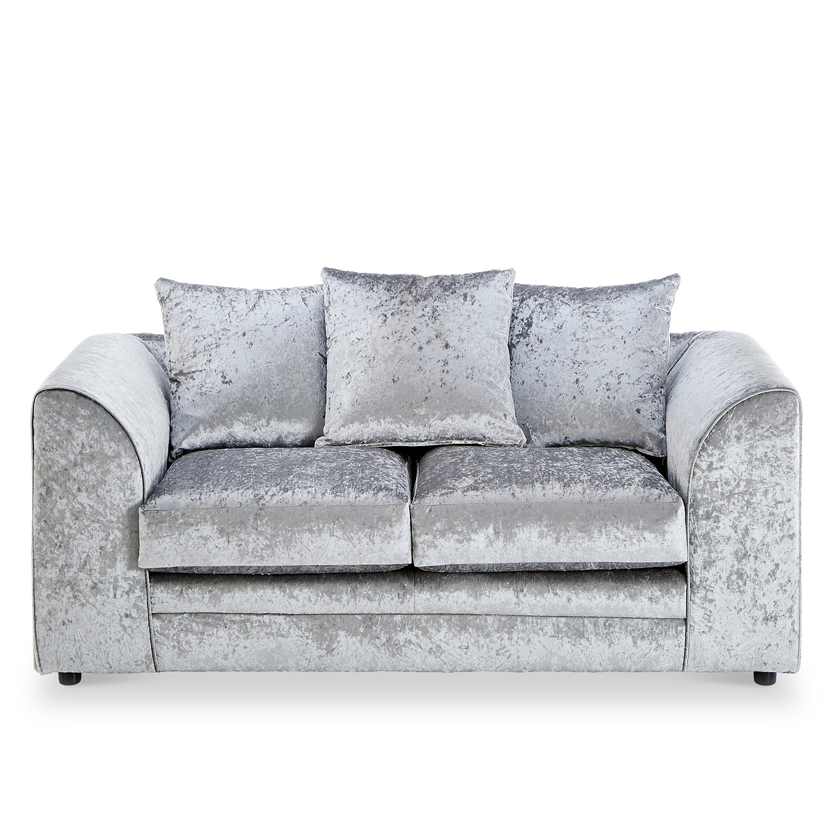 A silver crushed velvet sofa, with two matching cushions, sits idle against a white background, showcasing its plush texture and contemporary design.