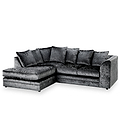 A plush, dark-toned sectional sofa with multiple cushions, stationary, against a white background.