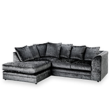 A plush, dark-toned sectional sofa with multiple cushions, stationary, against a white background.