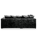 A black, textured sectional sofa with plush cushions on a white background.