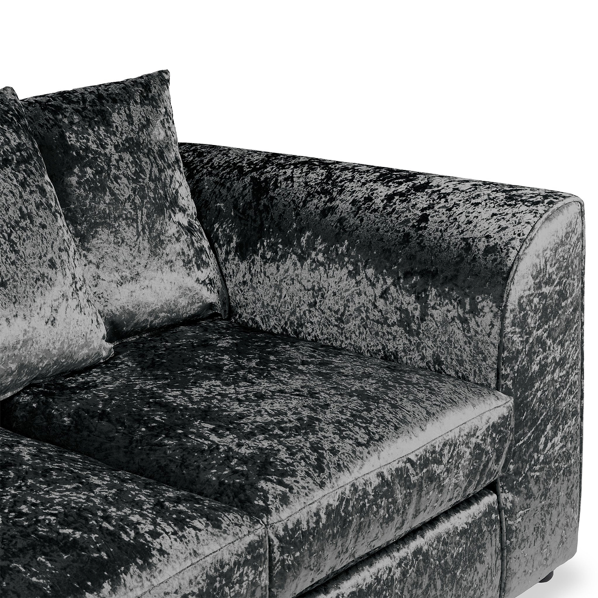 A crushed velvet corner sofa with scattered cushions, textured in grayscale, against a plain white background.