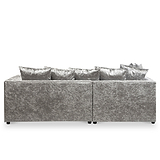 A metallic silver couch with plush cushions, resting stationary against a stark white background.
