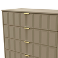A beige dresser with geometric patterning and gold handles, standing motionless, isolated against a neutral background.