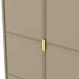 A beige double door with a golden handle on the right side, partially ajar, offering a glimpse of a similar colored wall behind it.