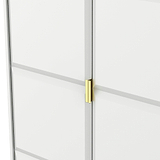A golden-colored door handle on a white door, slightly ajar, with a gray horizontal stripe, set against a plain background.