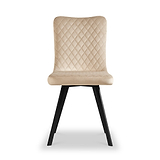 A beige, upholstered dining chair with quilted backrest and black angular legs stands against a white background.