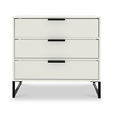 A modern, white three-drawer dresser with black handles, standing on four angled metal legs against a plain background.