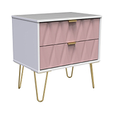 A pink and white modern chest of drawers with golden handles and angled legs, isolated on a plain background.