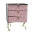 A modern dresser with a textured front, gold handles, and hairpin legs, isolated on a white background.