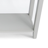 A modern, minimalist white table corner, showcasing its sleek lines and flat surfaces, set against a plain, homogenous background.