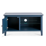 A navy blue wooden TV stand with an open shelf, a glass partition, and a cabinet door ajar, isolated against a white background.