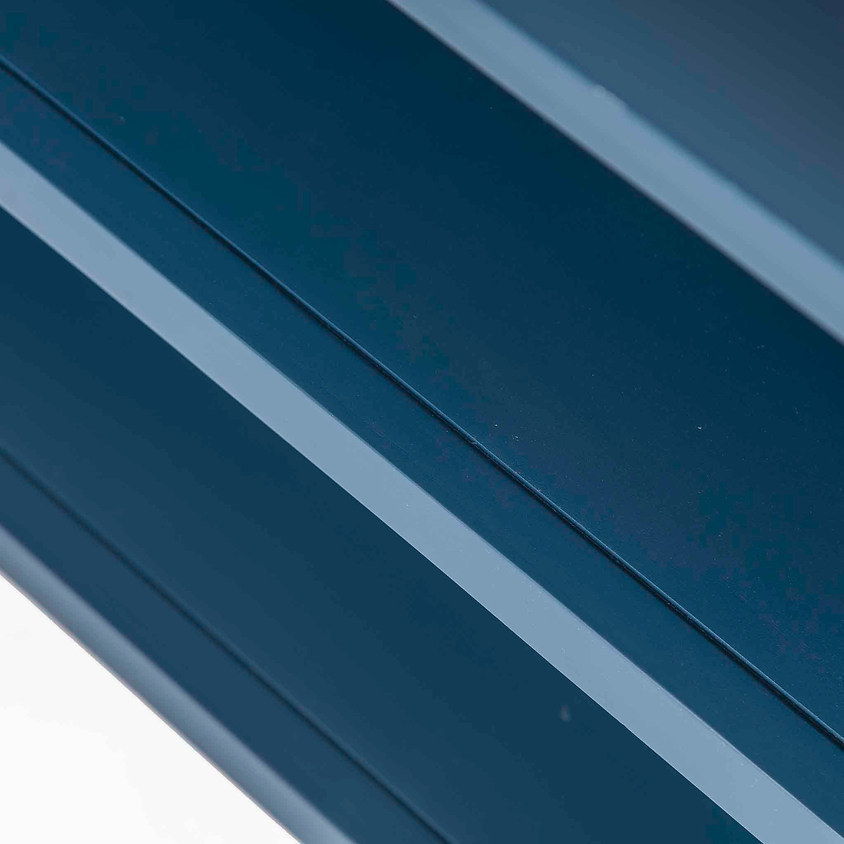 Stirling Blue Corner TV Stand - Close up of edge of shelves