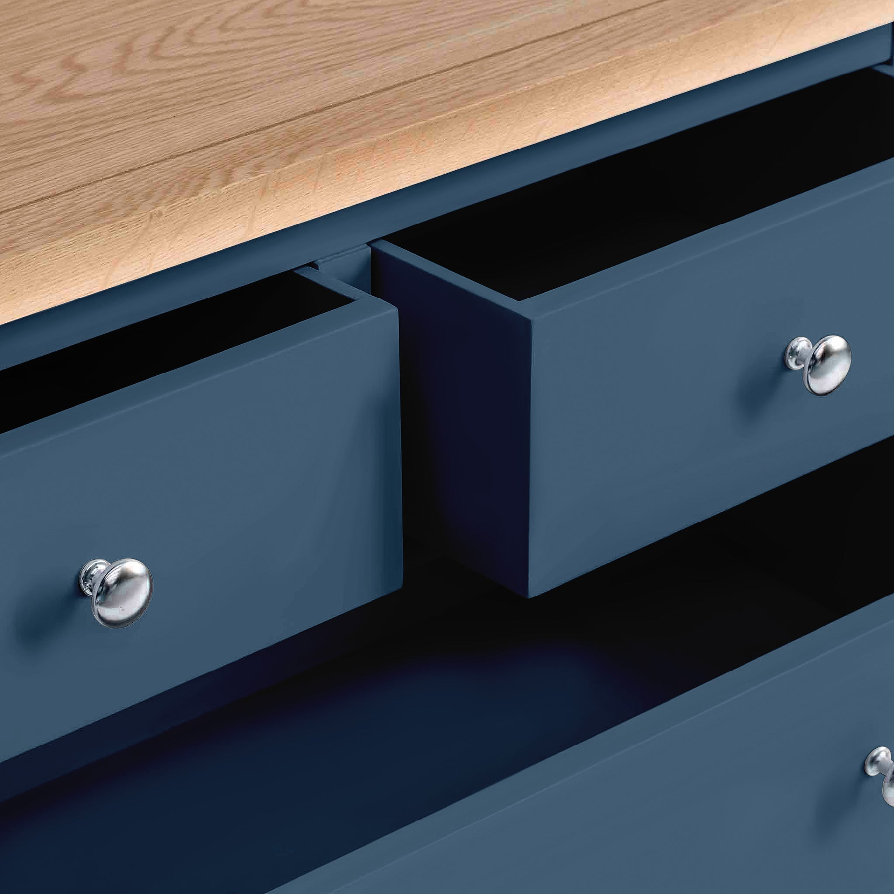 Farrow Navy Blue 2 Over 3 Chest Of Drawers from Roseland Furniture - Close up of drawers