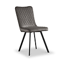 A grey upholstered chair with a diamond pattern and black legs stands isolated against a white backdrop.