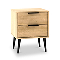 A light wooden two-drawer nightstand with black handles, resting on four angled black legs against a white background.