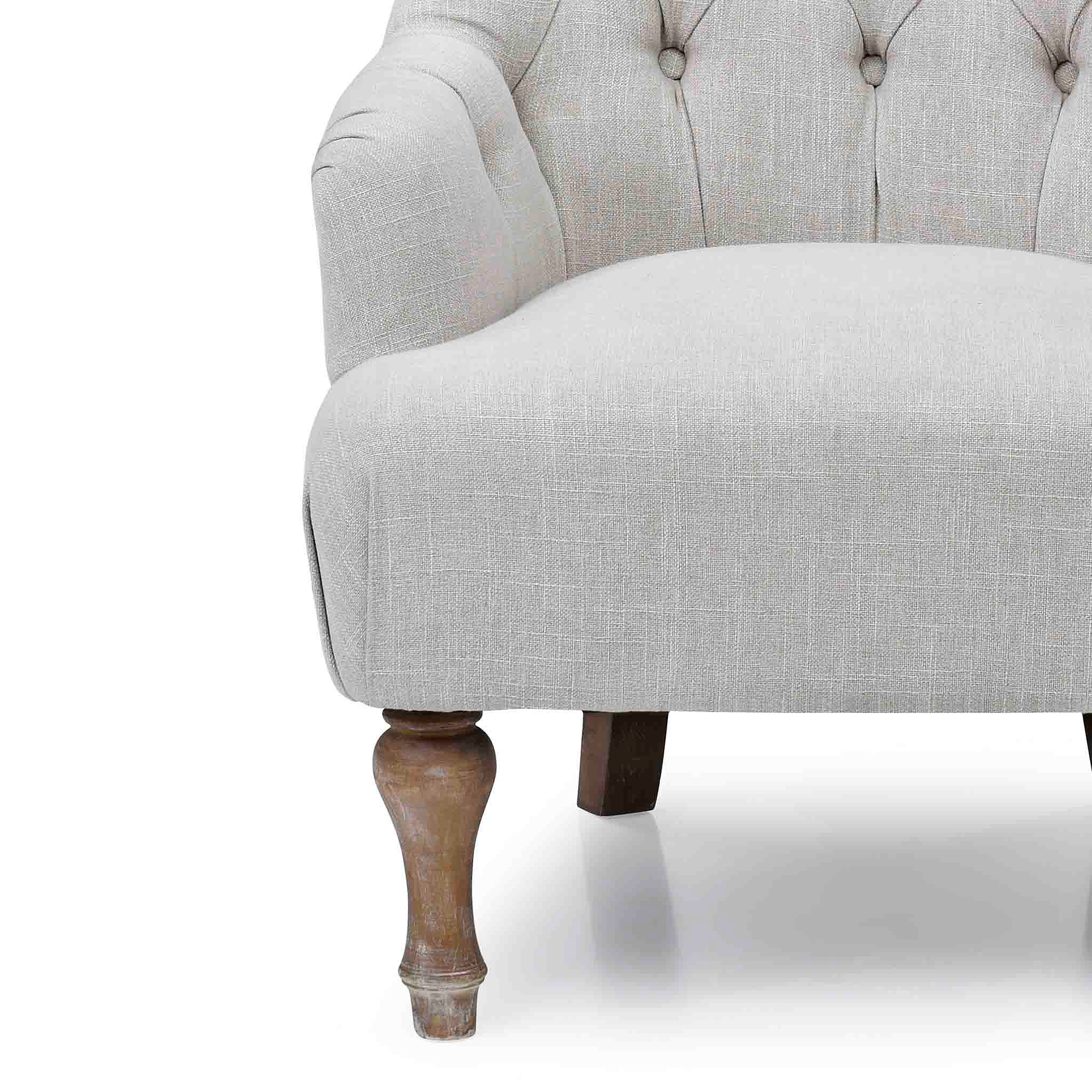 close up of the deep padded seat on the Cream Linen Fabric Bianca Armchair