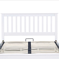 front view of the slatted headboard on the  Trent White Wooden Ottoman Bed 