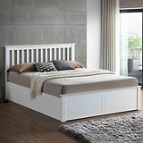 lifestyle image of the Trent White Wooden Ottoman Bed