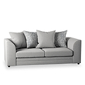 A grey upholstered sofa with three back cushions and two patterned throw pillows against a white background.