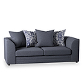 A gray upholstered sofa with three back cushions and two patterned throw pillows, isolated on a white background.