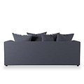 A dark gray contemporary sofa adorned with matching cushions is stationary against a white background.