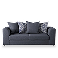A dark grey sofa with three cushions, two featuring a pattern, sits against a pure white background.