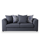A dark grey sofa with three cushions, two featuring a pattern, sits against a pure white background.