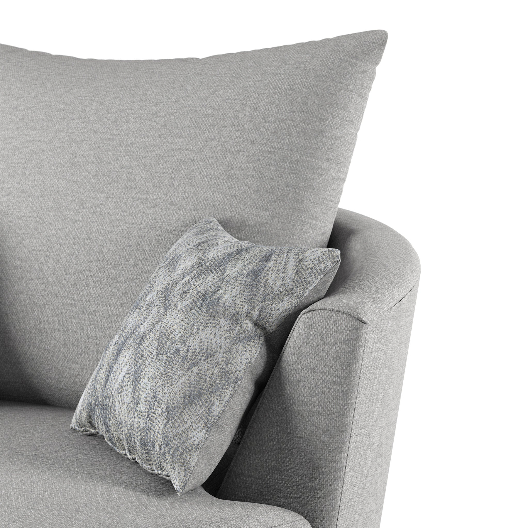 A grey fabric armchair with a patterned cushion; the focus is on the chair's soft textures and comfort. No text is present.
