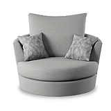 A round gray fabric armchair with one large back cushion and two patterned accent pillows is shown against a white background.