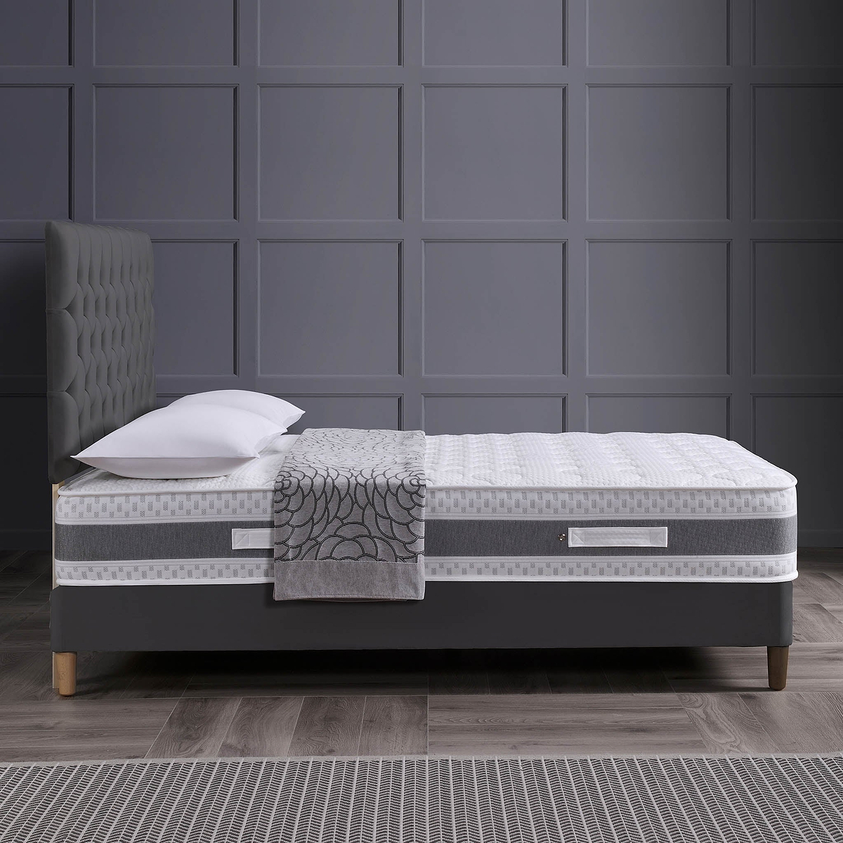 side lifestyle view of the Roseland Sleep Stratford Memory Coil Mattress