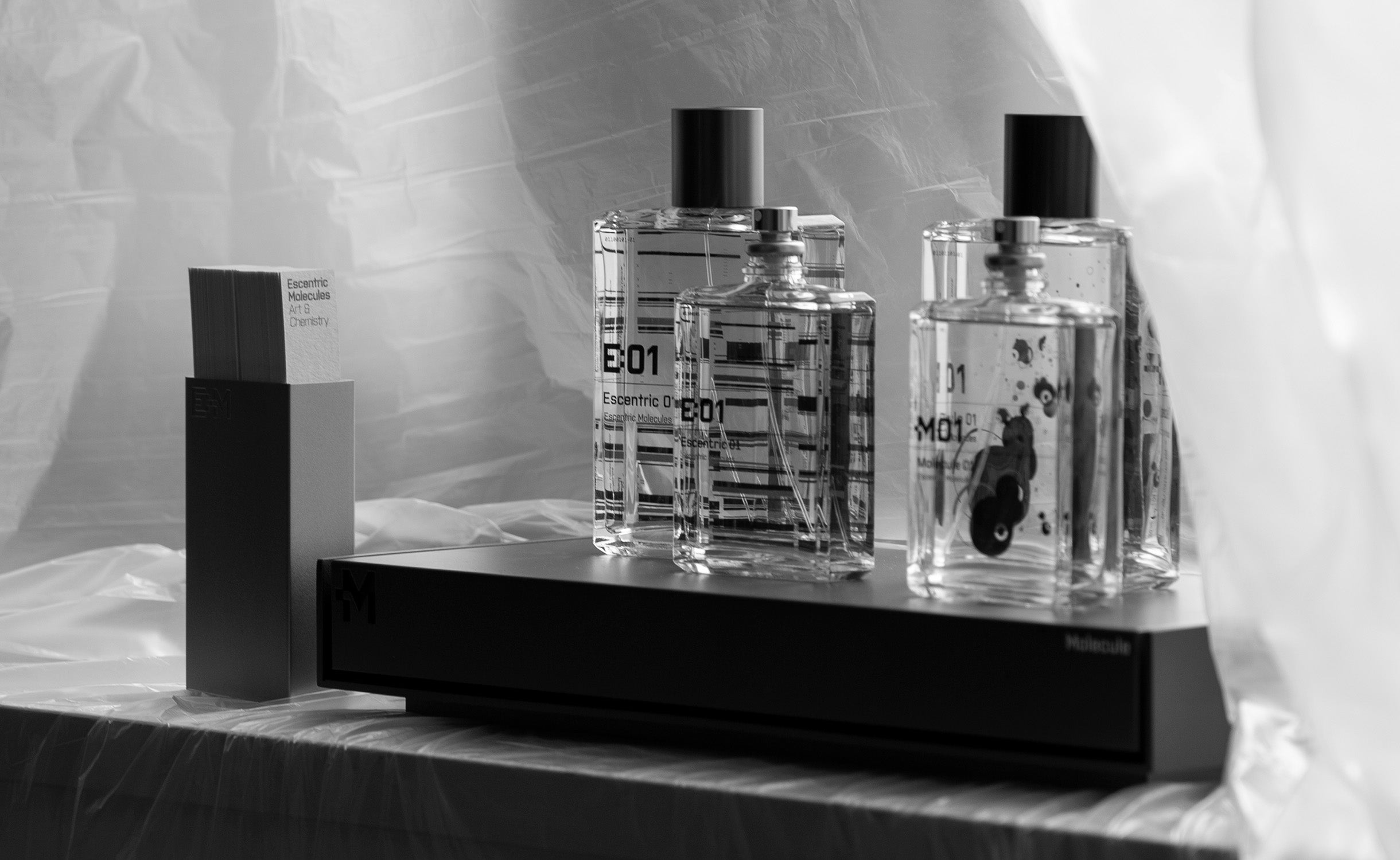 Escentric 01 and Molecule 01 fragrance bottles displayed at ioannes A Salon in Berlin.