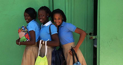 Three girls in school uniforms
