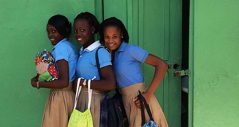 Three girls in school uniforms