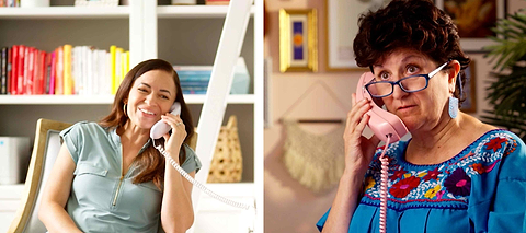 Two women connect over a heartfelt phone call, sharing laughter, support, and meaningful conversation across generations.