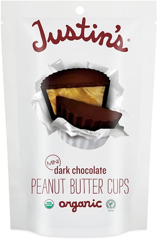 Bag of Justin’s organic dark chocolate peanut butter cups with candy image on front.