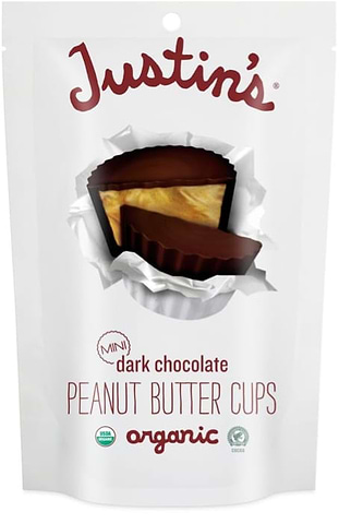 Bag of Justin’s organic dark chocolate peanut butter cups with candy image on front.