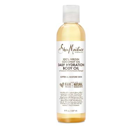 Bottle of SheaMoisture 100% Virgin Coconut Oil Daily Hydration Body Oil on gray background.