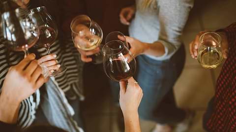 Friends drinking wine together