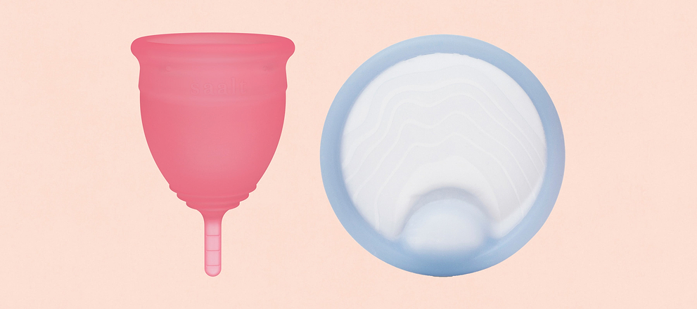 A dark pink menstrual cup shown next to a top-down view of a blue menstrual disc on a light pink background.
