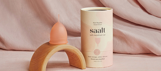 Soft silicone menstrual cup displayed with elegant packaging for a comfortable, reusable period care solution.