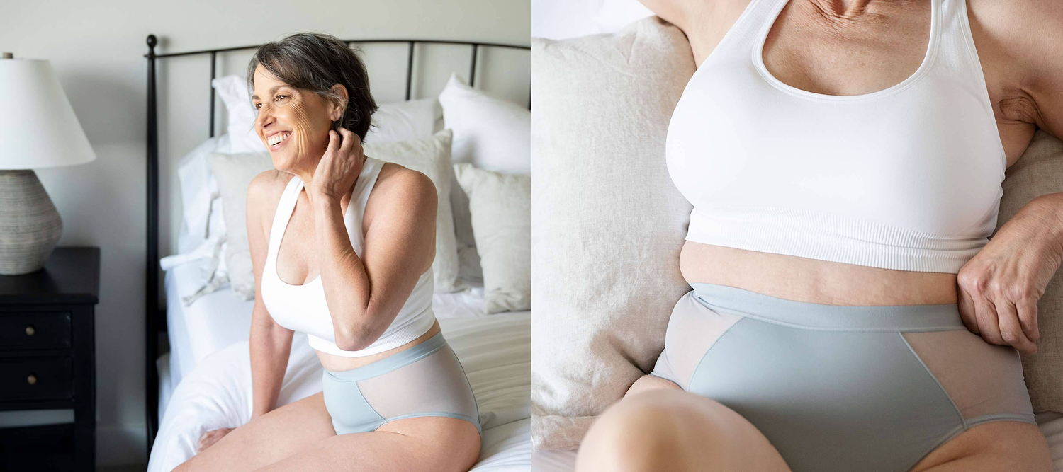 Woman relaxing on a bed wearing comfortable underwear and a white sports bra.
