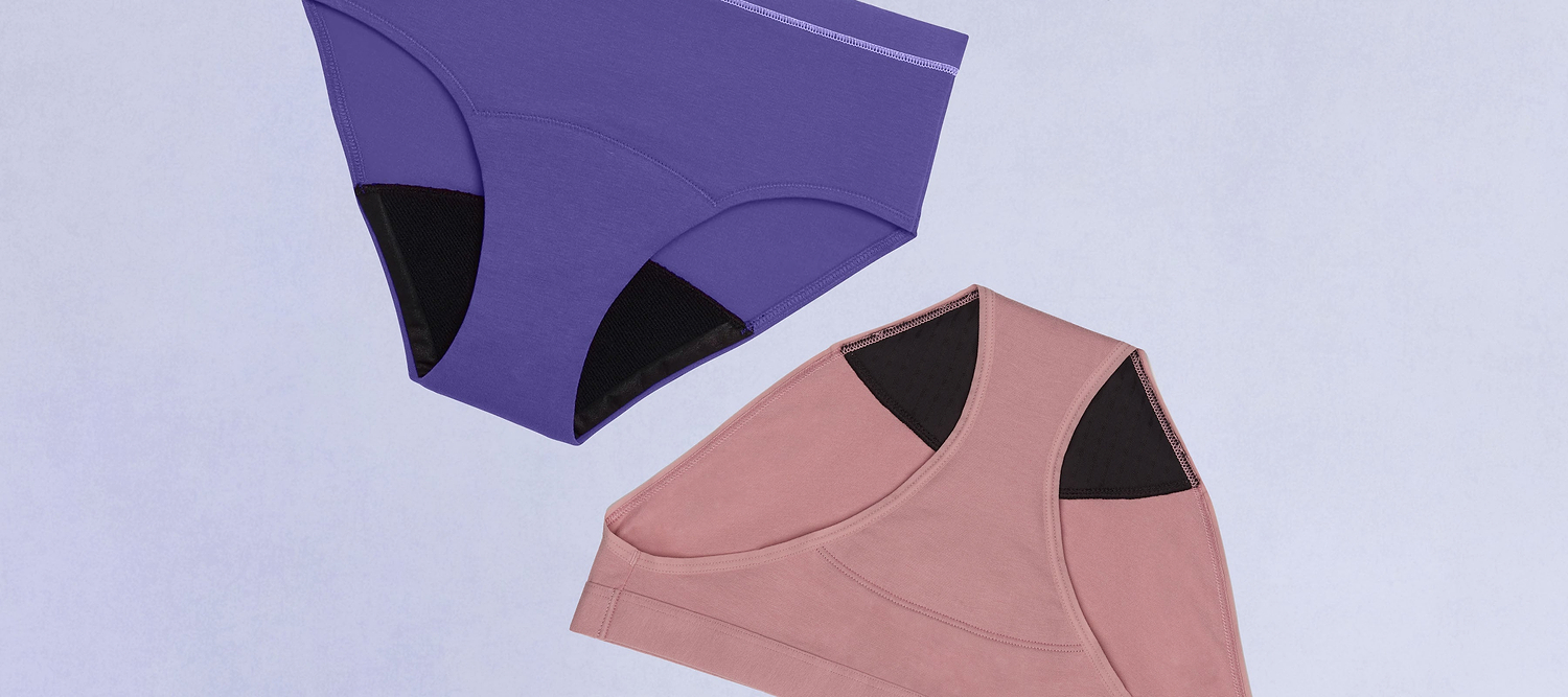 Purple and pink period underwear displayed against a light background.