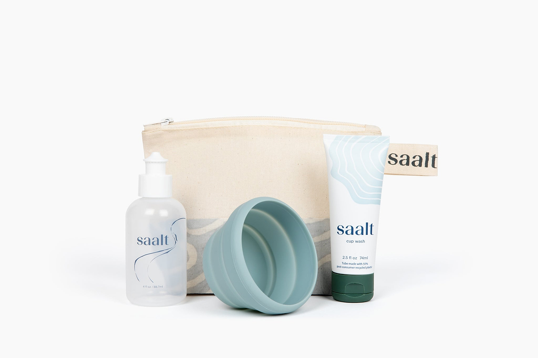 Saalt menstrual cup care kit with wash bottle, cup wash tube, collapsible sterilizing cup, and zip pouch