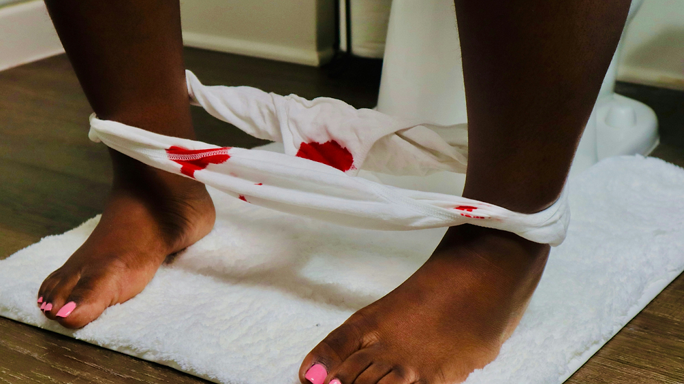 Woman With Menstrual Stains On White Underwear