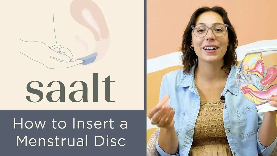 Educational graphic and presenter demonstrating how to insert a menstrual disc.