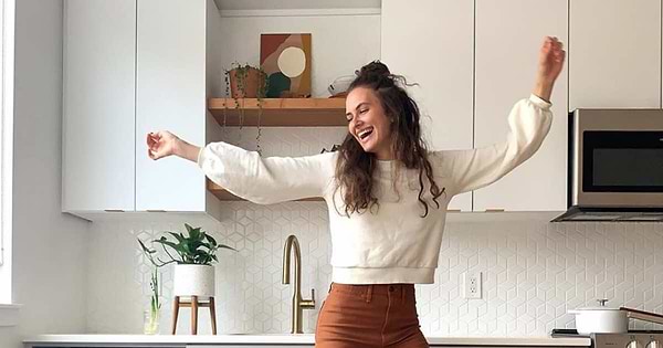 Kennedy Haffner jumping in her kitchen.